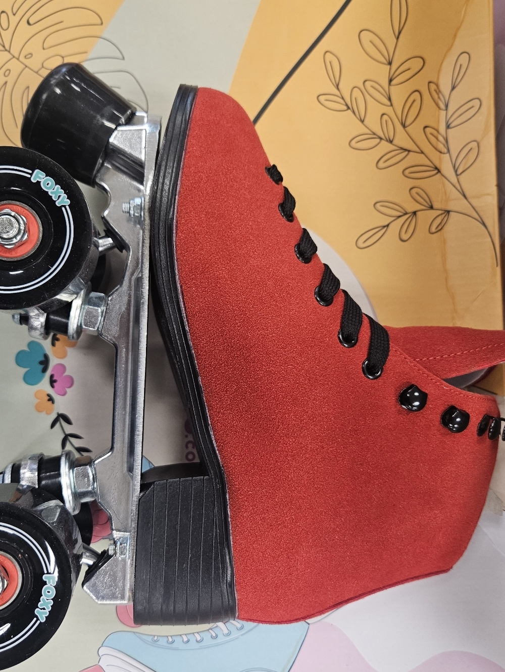 Red Roller Skate with Black Wheels